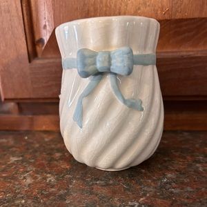 Little white dish with blue ribbon